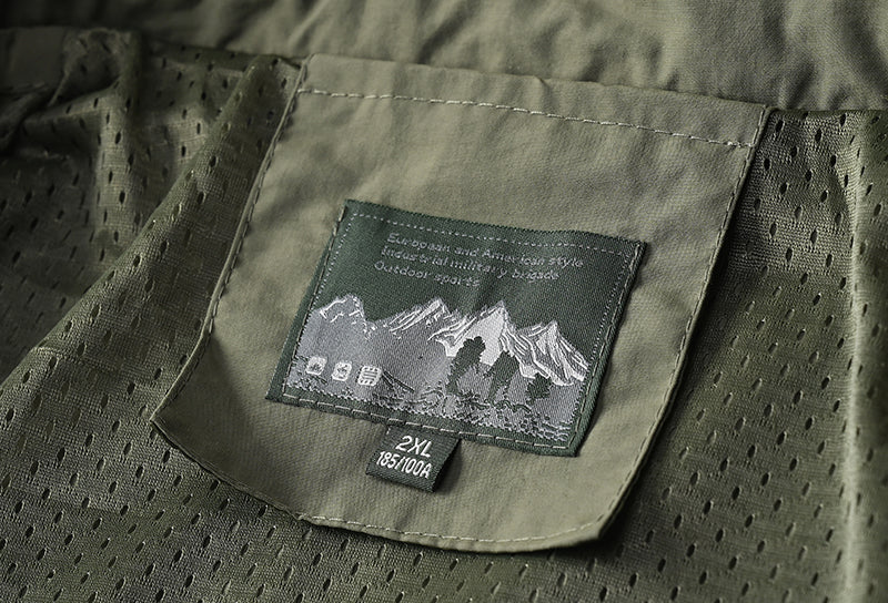 Alpine Guardian Tactical Windbreaker – Waterproof, Hooded, and Built for Adventure